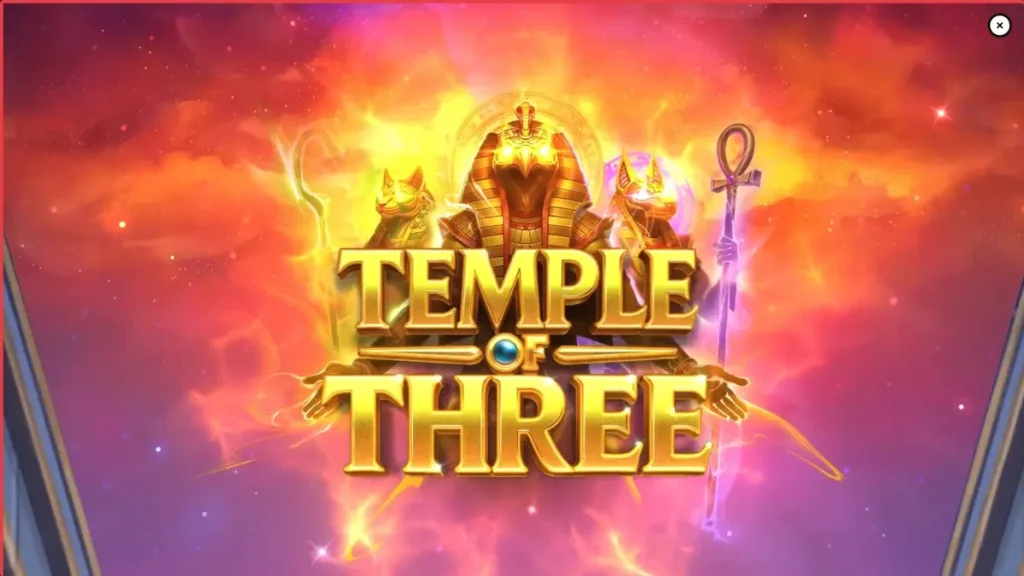 Temple of Three slot machine interface featuring Egyptian deity statues and golden coin symbols.