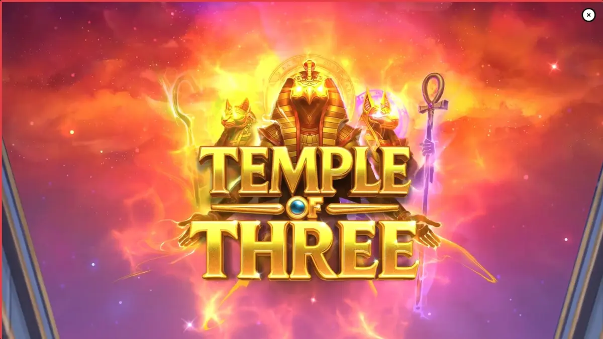 Temple of Three slot machine interface featuring Egyptian deity statues and golden coin symbols.